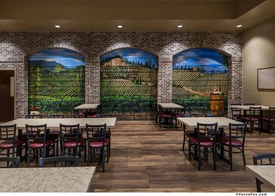 The mural room at Paisan's set for a private dinner