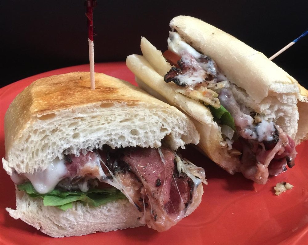 The Hot Italian Muffuletta: pastrami, mozzarella, and muffuletta mix