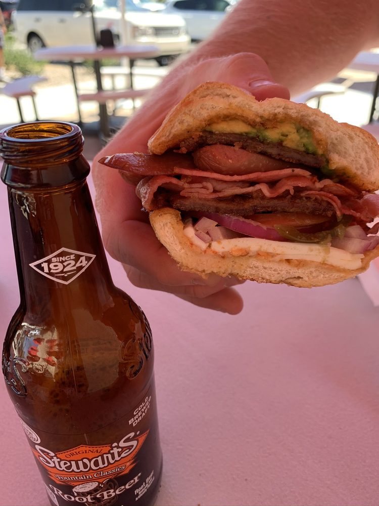 The Torta Cubana on a telera roll at the patio tables