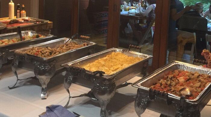 Chafing dishes at a catered buffet